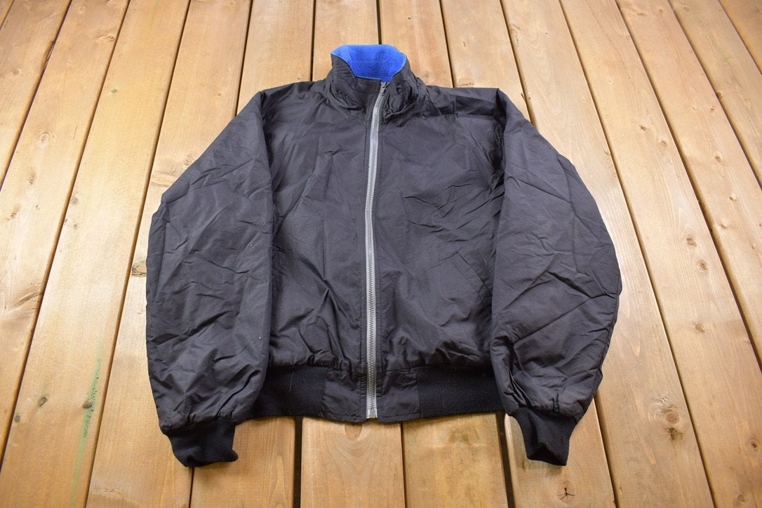 Vintage 1980s Columbia Sportswear Fleece Lined Black Satin Bomber Jack –  LOST BOYS VINTAGE