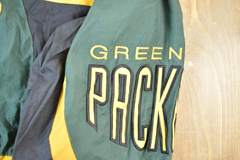 Vintage 1990s Green Bay Packers AOP Proline Logo Athletic NFL Football Warm Up Spring Jacket Made In USA