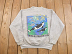 Vintage 1990s Thrashed Sea World Orca Whale Graphic Crewneck Sweatshirt  90s Crewneck  Souvenir  Made In USA  Travel Tourism  Dolphins