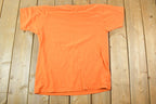 Vintage 1990s Saints Basketball Camp Souvenir Single Stitch Graphic Print T-Shirt Made In USA
