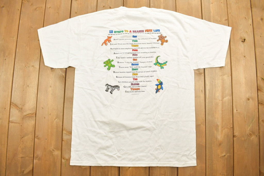 Vintage 1990s Beanie Ford Clinic Parody Graphic T-Shirt