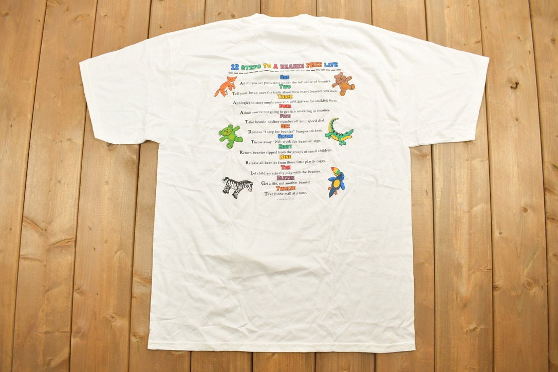 Vintage 1990s Beanie Ford Clinic Parody Graphic T-Shirt