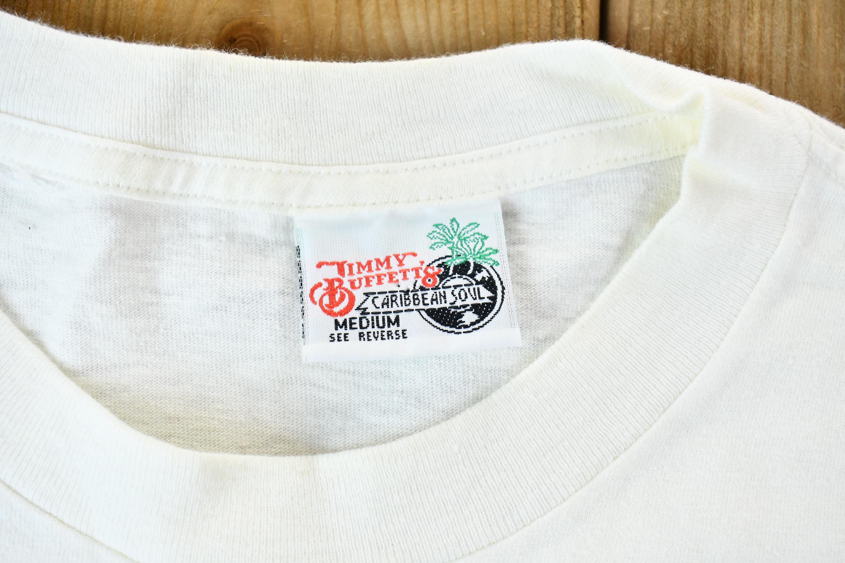 Vintage 1990s Jimmy Buffett's Caribbean Soul Tourist Penguin Souvenir Single Stitch Graphic T-Shirt