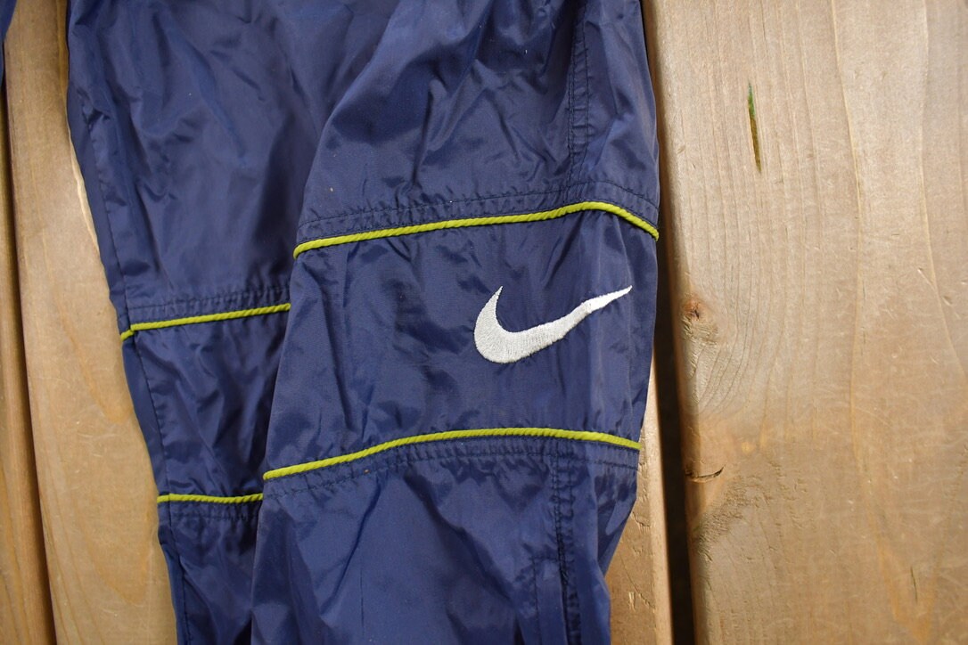 Vintage 1990s Nike Mini Swoosh Track Pants Size XL