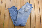 Vintage 1990s Levi's 550 Red Tab Denim Jeans Size 34 x 35