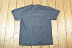 Vintage 1990s Hello My Name Is Trouble Souvenir T-Shirt Men's L