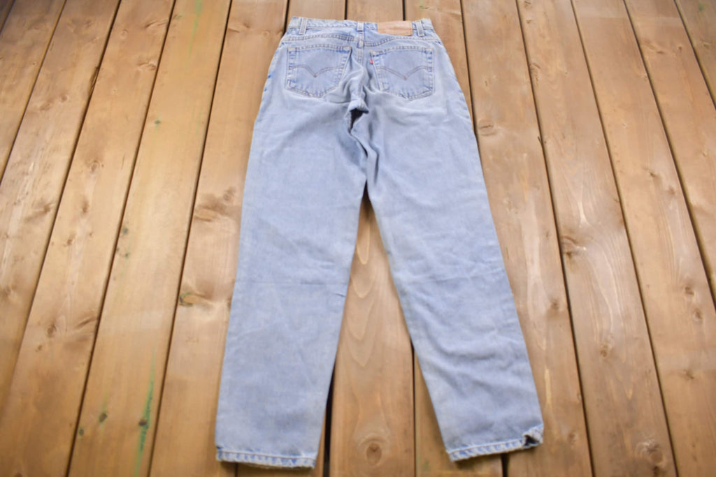 Vintage 1990s Levi's 550 Red Tab Light Wash Jeans Size 26 x 29