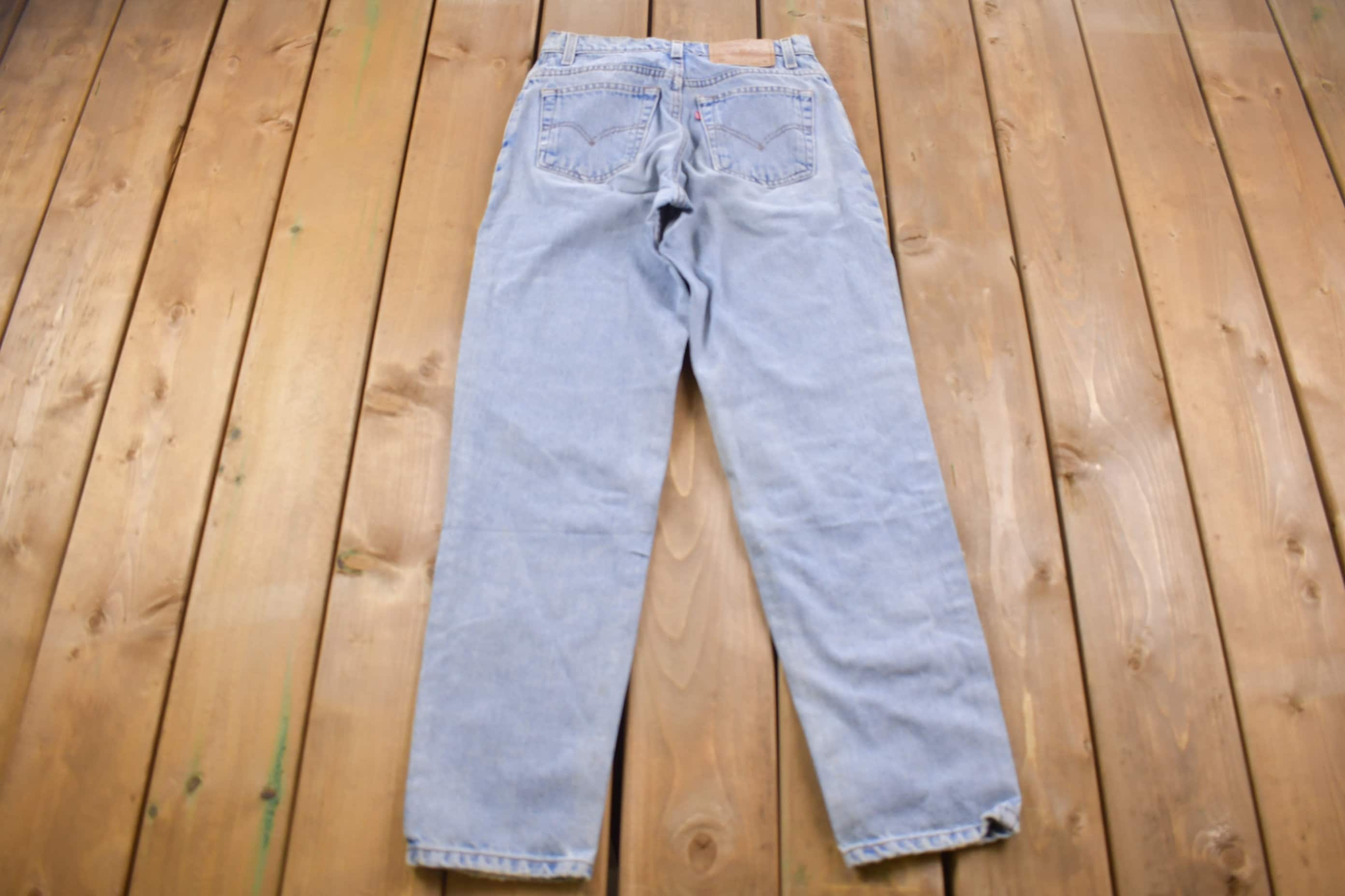Vintage 1990s Levi's 550 Red Tab Light Wash Jeans Size 26 x 29
