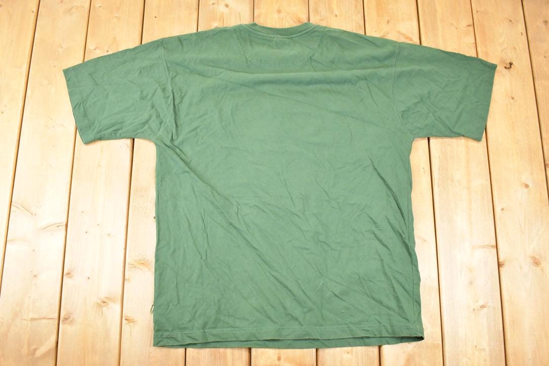 Vintage 1990s Starter Minnesota Wild Cup Crazy NHL T-Shirt Men's XL