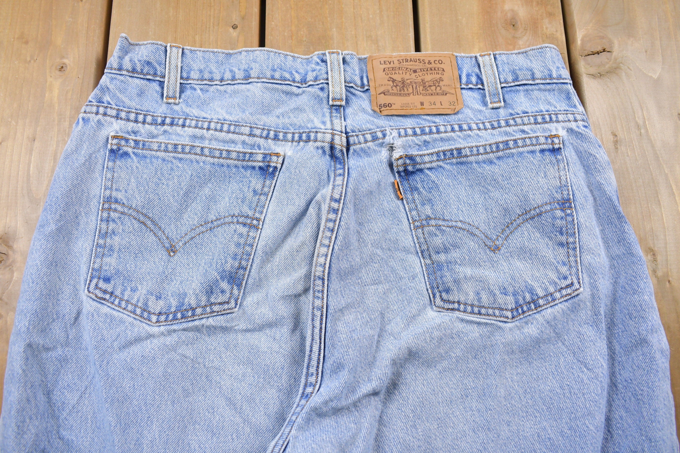 Vintage 1990s Levi's 560 Orange Tab Jeans Size 32 x 31