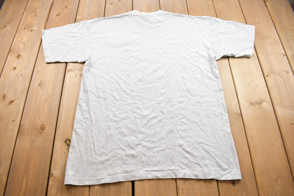 Vintage 1990s Castaways West Seneca Striped Mock Neck Graphic T Shirt