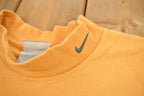 Vintage 1990s Nike Embroidered Mini Swoosh Mockneck Sweatshirt