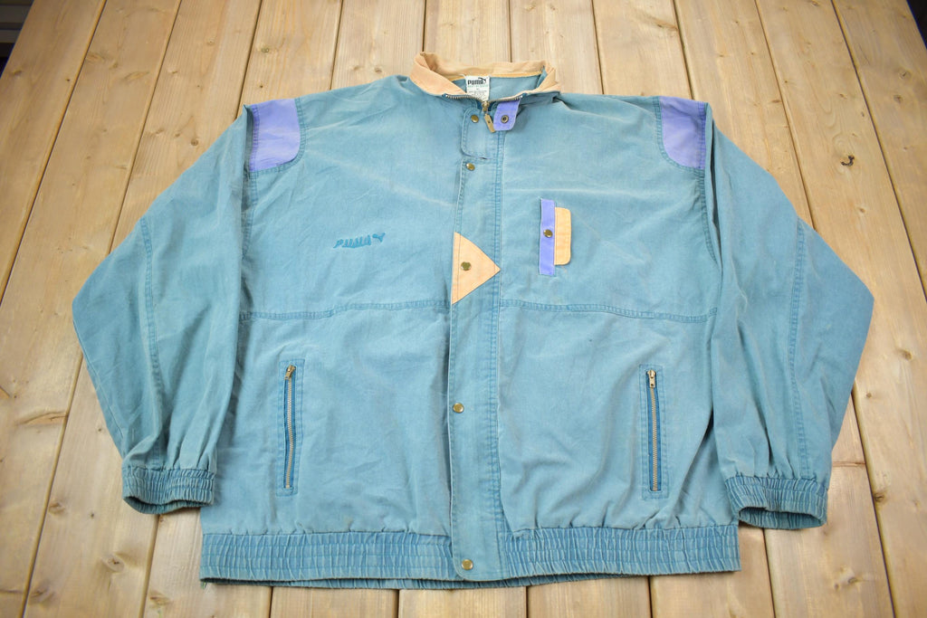 Vintage 1990s Puma Embroidered Sun Faded Windbreaker Jacket Size XL
