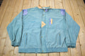 Vintage 1990s Puma Embroidered Sun Faded Windbreaker Jacket Size XL