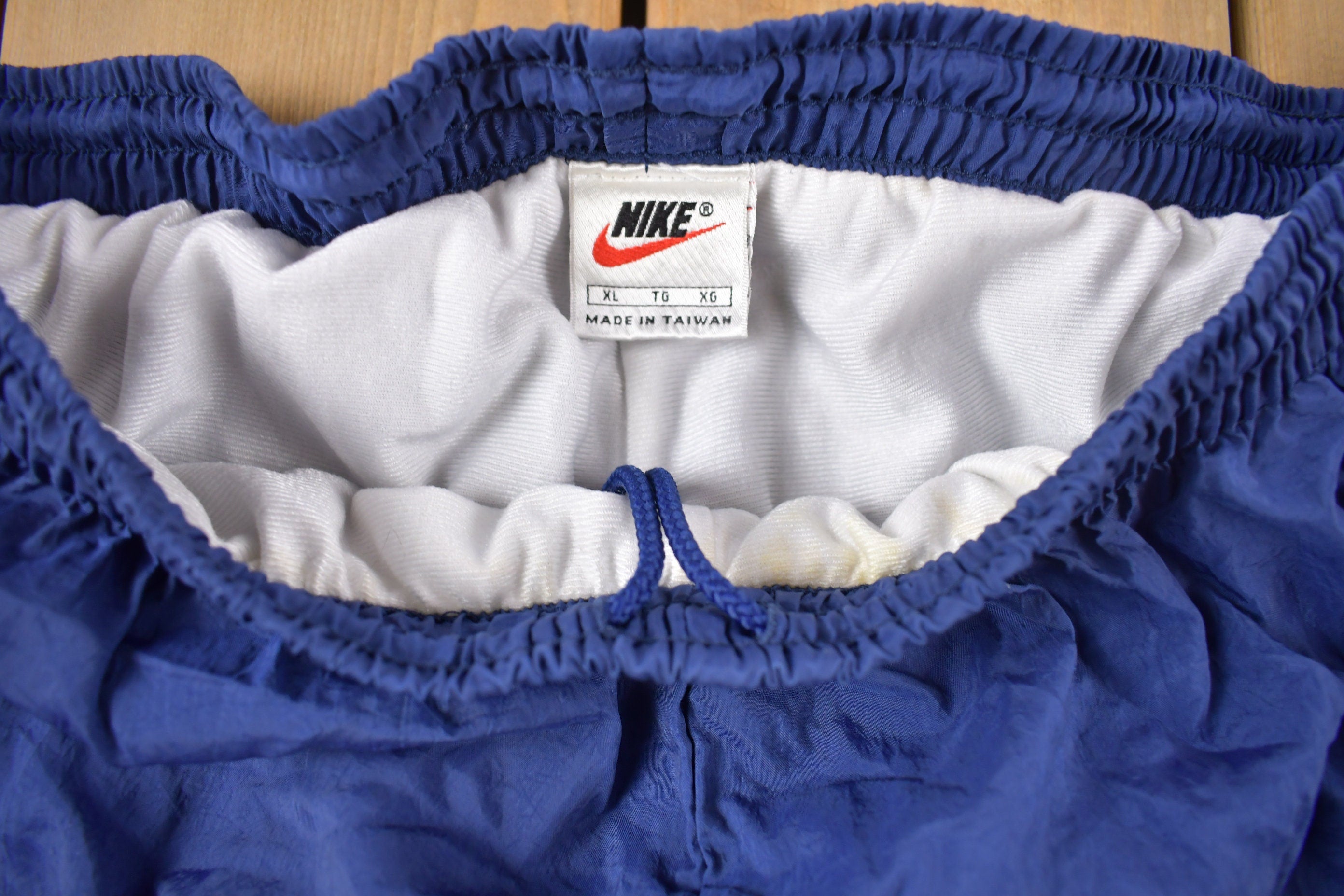 Vintage 1990s Blue Nike Mini Swoosh Windbreaker Pants Size XL