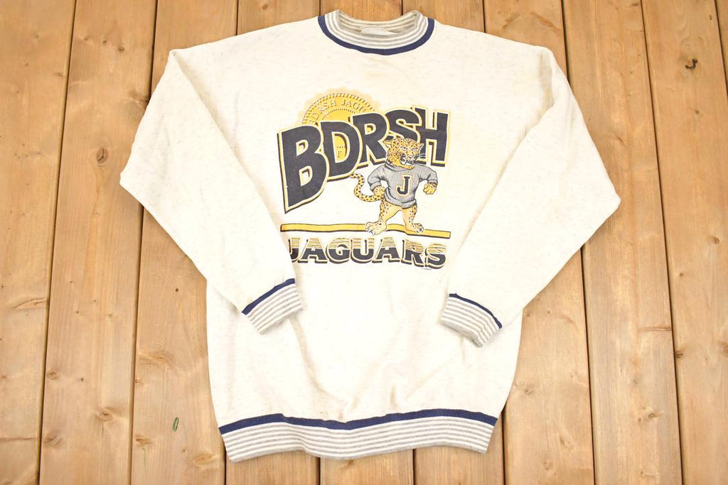 Vintage 1990s BDRSH Jaguars Cartoon University Crewneck Sweater Men's L