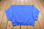 Vintage 1990s Blank Blue Crewneck Fruit of the Loom Sweatshirt