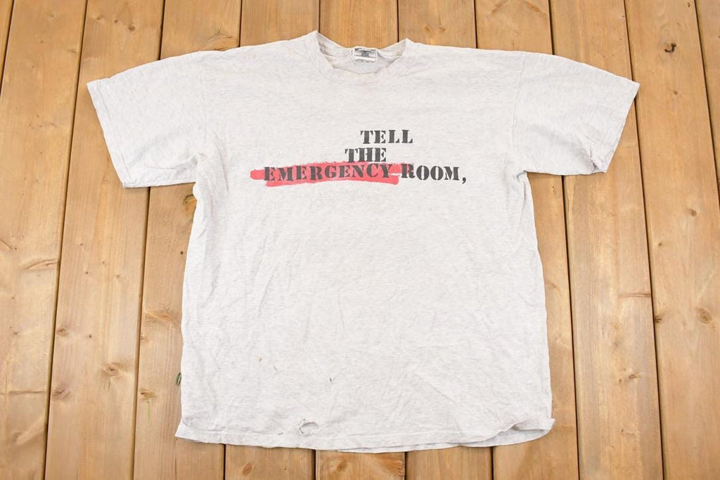 Vintage 1990s Nike Emergency Room Graphic Print Souvenir Basketball T-Shirt Men's L