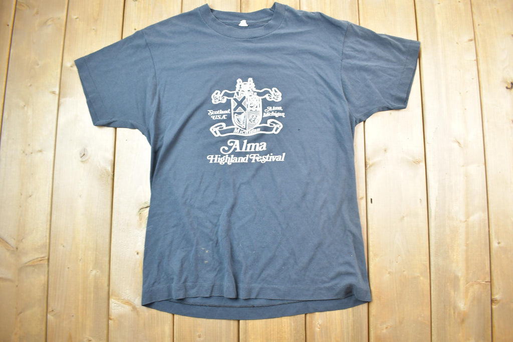 Vintage 1990s Alma Highland Festival Graphic T-Shirt
