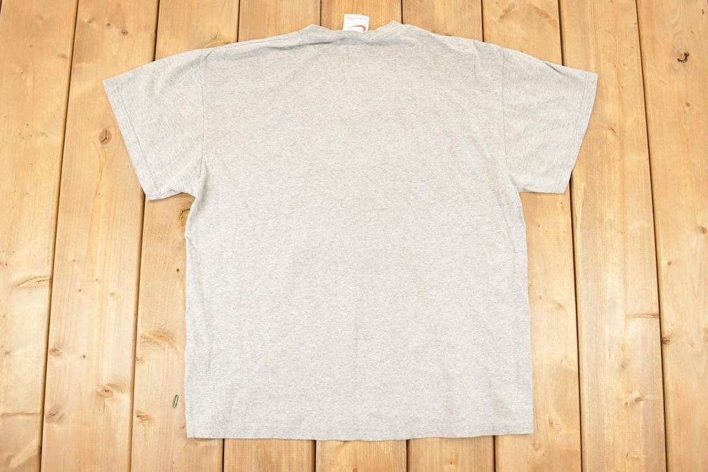 Vintage 1990s Nike Athletics Graphic Print Sportswear T-Shirt Men's L