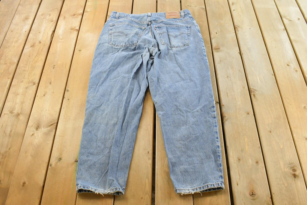 Vintage 1990s Levi's 560 Loose Fit Denim Blue Jeans Size 35 x 30 / 90s Levi's / Distressed Sun Faded Jeans / Streetwear