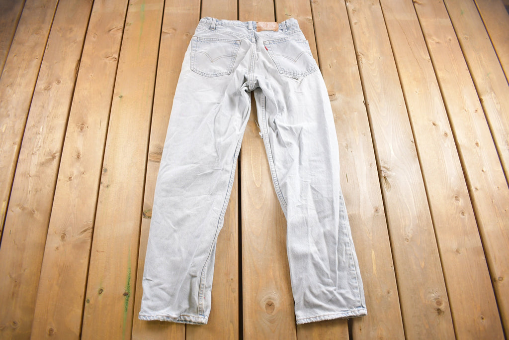Vintage 1990s Levi's 550 Light Wash Distressed Jeans Size 30 x 30