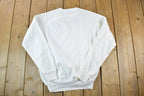 Vintage 1990s Catch The Rainbow Cartoon Sketch Souvenir Crewneck Sweatshirt Made In USA