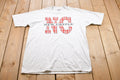 Vintage 1990s New Castle Plaid Graphic T-Shirt