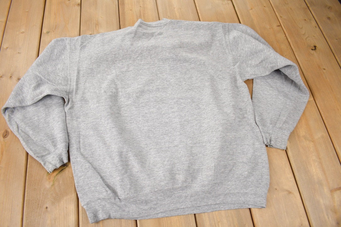 Vintage 1990s Detroit Redwings NHL Hockey Crewneck Sweatshirt Made In Canada