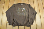 Vintage 1990s Northern Reflections Birds Nature Graphic Crewneck Sweater Adult S-M