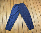 Vintage 1990s Nike Mini Swoosh Tearaway Click Button Track Pants