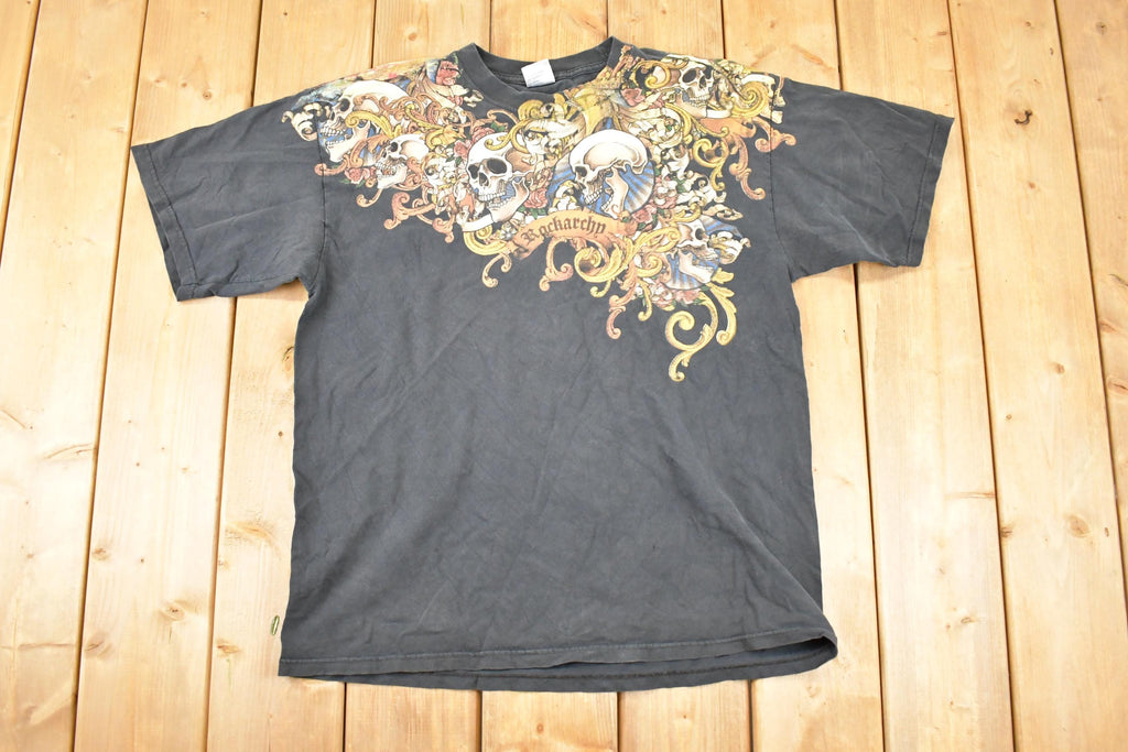 Vintage 1990s Rackarchy AOp Skulls Souvenir T-Shirt Men's L