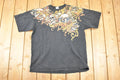 Vintage 1990s Rackarchy AOp Skulls Souvenir T-Shirt Men's L