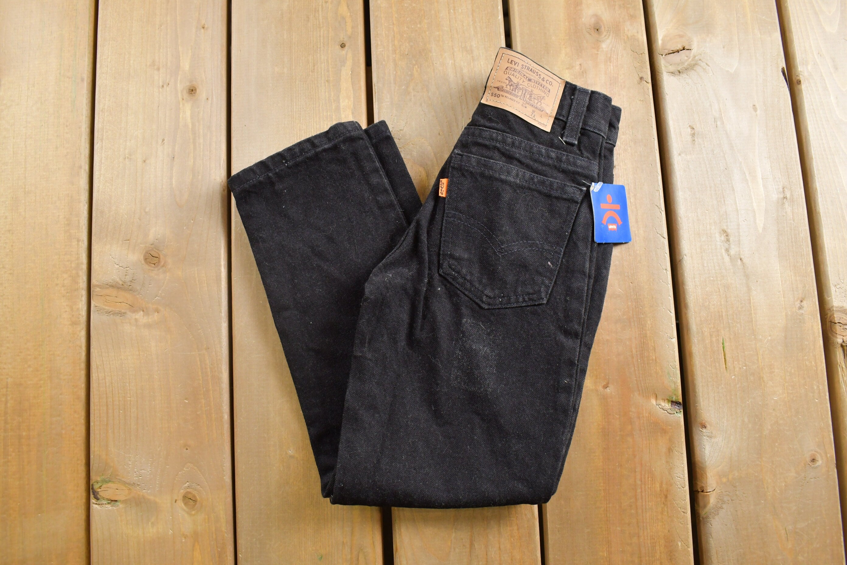 Deadstock Vintage 1990s Levi's 550 Orange Tab Jeans Size 22 x 21