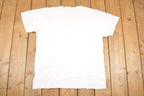 Vintage 1990s Napa Delta Champion Spark Plugs Souvenir Automotive T-Shirt Men's L
