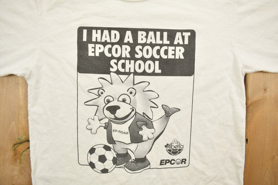 Vintage 1990s Youth Epcor Soccer School Umbro Graphic T-Shirt