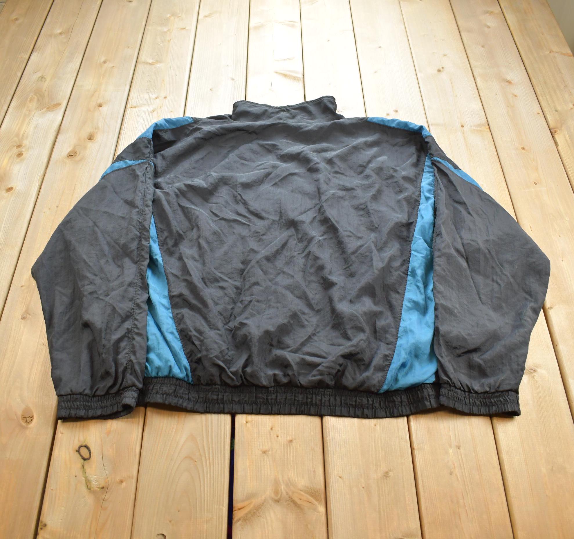 Vintage 1990s Puma Embroidered Windbreaker Jacket