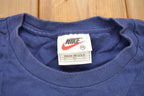 Vintage 1990s Nike Town USA Embroidered T Shirt