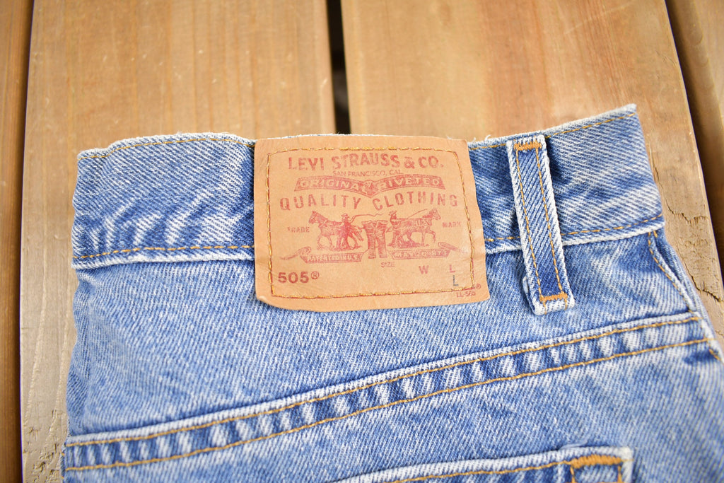 Vintage 1990s Levi's 505 Low Rise Distressed Denim Jeans Size 31 x 32