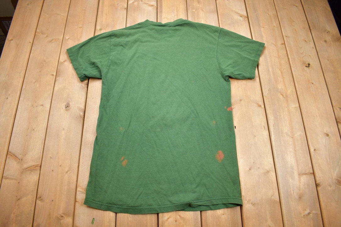 Vintage 1990s Rage Against The Machine We Support Our Troops Band T-Shirt