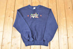 Vintage 1990s Embroidered Golf Vacation FAB Crewneck Sweatshirt Men's M  Made In USA  90s Cartoon Destination Sweater