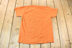Vintage 1990s Orange Souvenir Arizona USA Feather and Bead Horse Travel T-Shirt