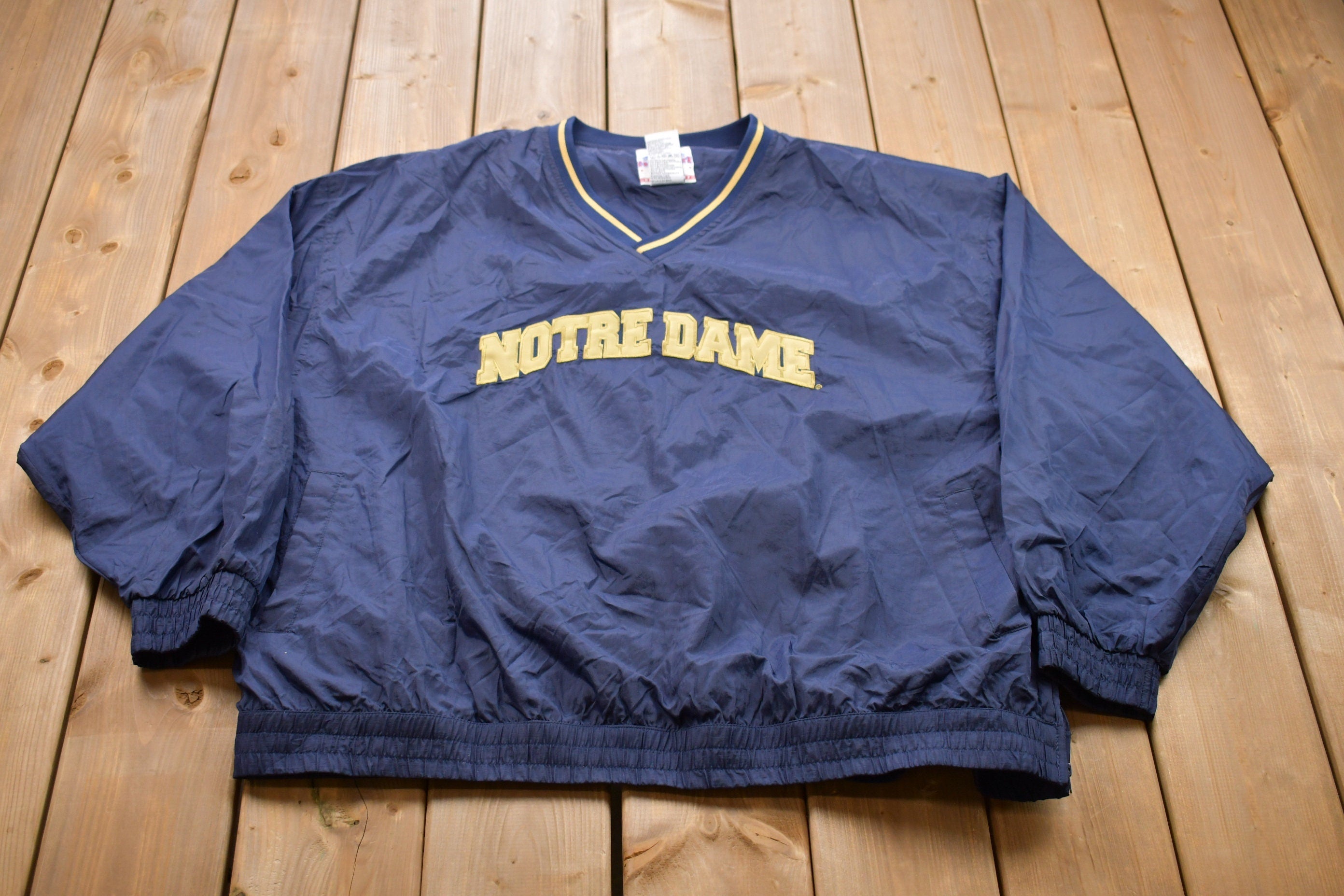 Vintage 1990s Champion Notre Dame Graphic Windbreaker Jacket