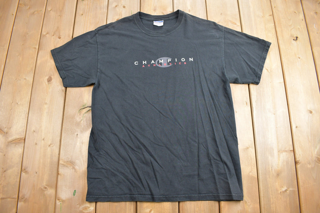 Vintage 1990s Champion Athletics Graphic T Shirt