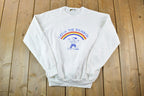 Vintage 1990s Catch The Rainbow Cartoon Sketch Souvenir Crewneck Sweatshirt Made In USA