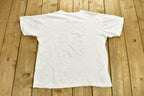 Vintage 1990s Hey Mon Are Jammin Bahamans T-Shirt