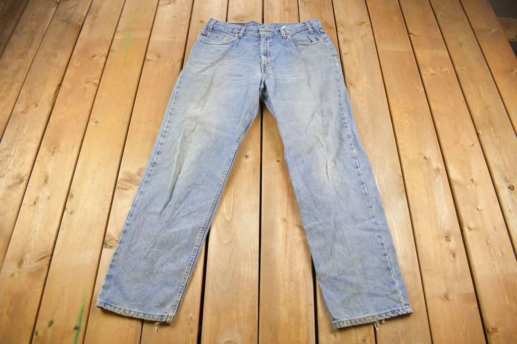 Vintage 1990s Levi's 550 Relaxed Fit Light Wash Jeans Size 34 x 30