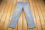 Vintage 1990s Levi's 550 Relaxed Fit Light Wash Jeans Size 34 x 30