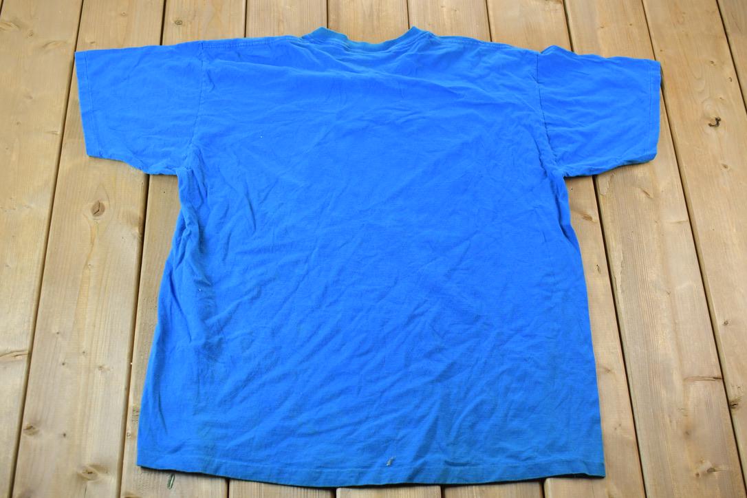 Vintage 1990s United Blues Apparel Single Stitch Graphic T-Shirt