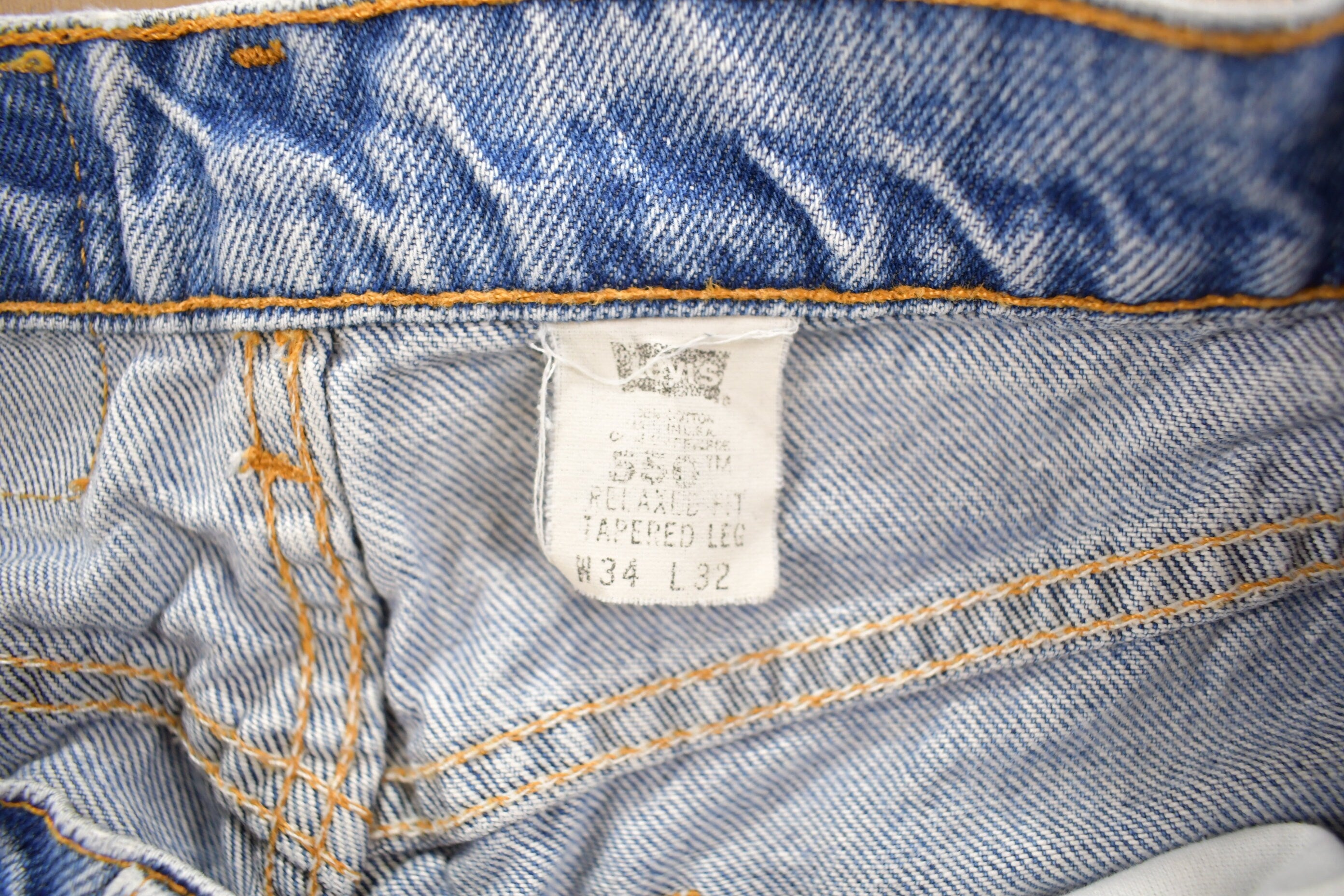 Vintage 1990s Levi's 550 Orange Tab Jeans Size 32 x 30